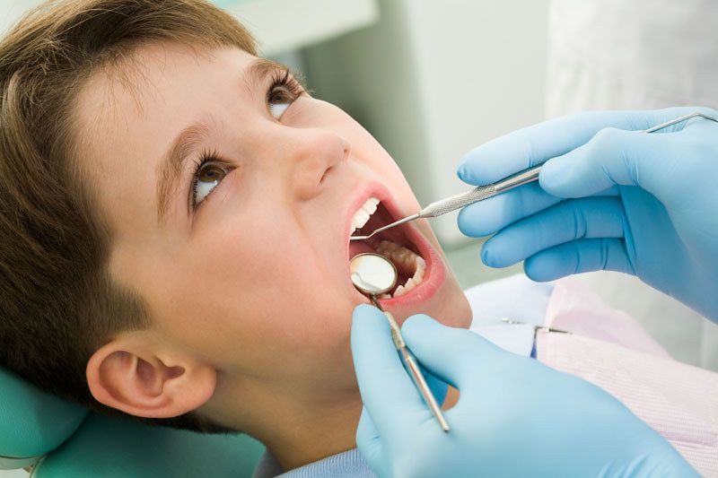 children-receiving-dental-treatment
