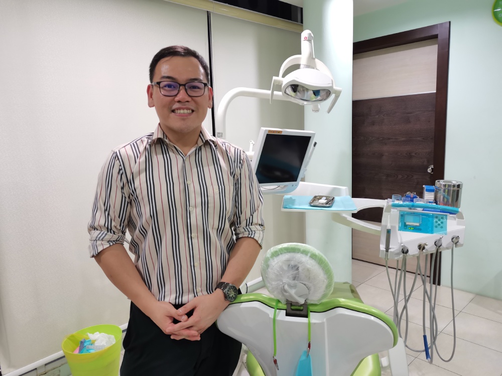 dr-ong-in-millennium-care-dental-treatment-room